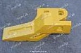 Зуб ковша боковой левый DG966-11100-2Z Зуб ковша боковой левый DG966-11100-2Z